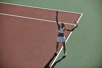 Image showing young woman play tennis outdoor