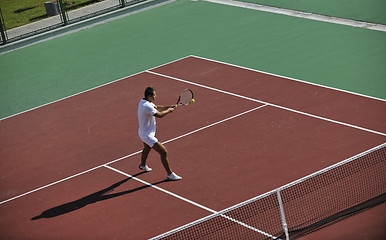 Image showing young man play tennis