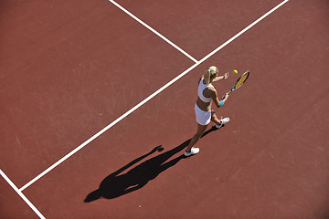 Image showing young woman play tennis outdoor