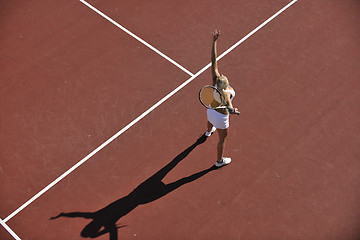 Image showing young woman play tennis outdoor