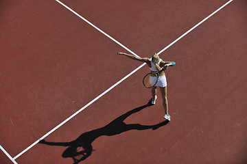 Image showing young woman play tennis outdoor