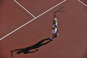 Image showing young woman play tennis outdoor