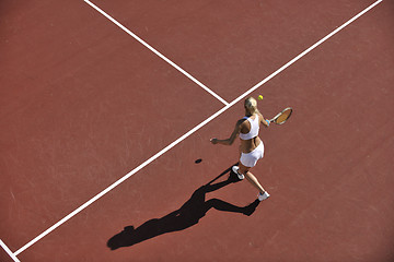 Image showing young woman play tennis outdoor