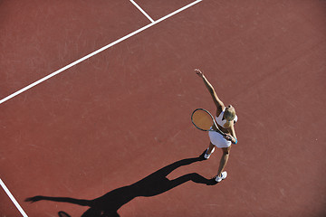 Image showing young woman play tennis outdoor