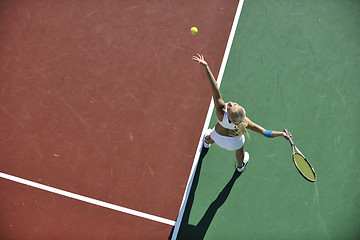 Image showing young woman play tennis outdoor