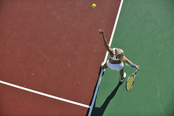 Image showing young woman play tennis outdoor