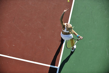 Image showing young woman play tennis outdoor