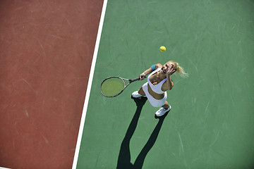 Image showing young woman play tennis outdoor