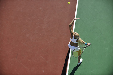 Image showing young woman play tennis outdoor