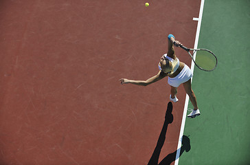 Image showing young woman play tennis outdoor