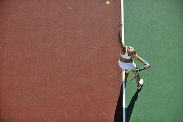 Image showing young woman play tennis outdoor