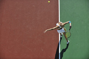 Image showing young woman play tennis outdoor