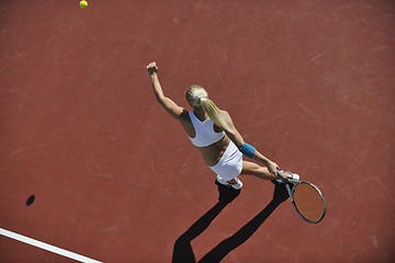 Image showing young woman play tennis outdoor