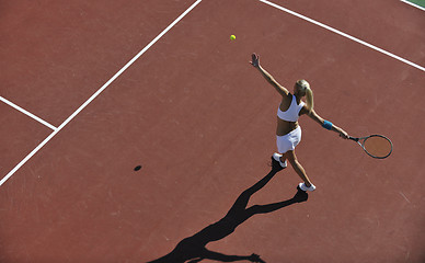 Image showing young woman play tennis outdoor