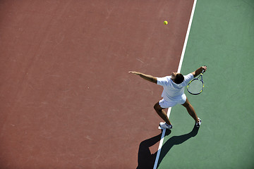 Image showing young man play tennis