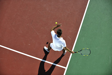 Image showing young man play tennis