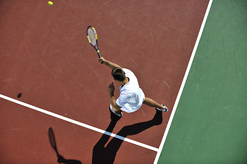 Image showing young man play tennis