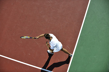 Image showing young man play tennis