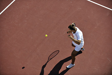 Image showing young man play tennis