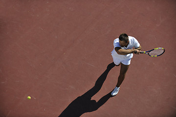 Image showing young man play tennis