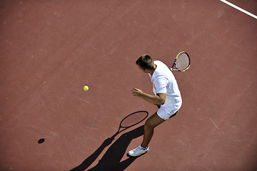 Image showing young man play tennis