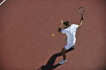 Image showing young man play tennis