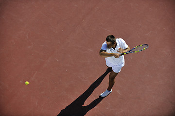 Image showing young man play tennis
