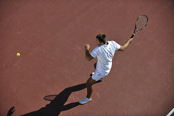 Image showing young man play tennis