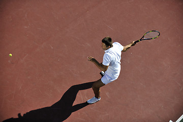 Image showing young man play tennis