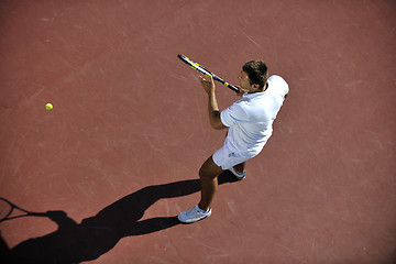 Image showing young man play tennis