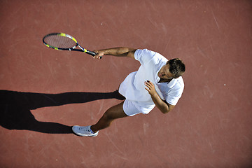 Image showing young man play tennis