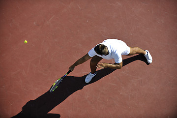 Image showing young man play tennis