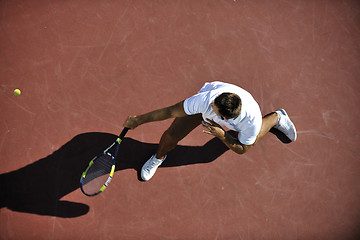 Image showing young man play tennis