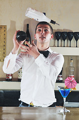 Image showing pro barman prepare coctail drink on party