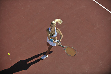 Image showing young woman play tennis outdoor