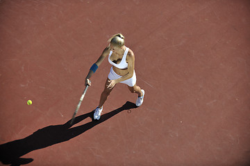 Image showing young woman play tennis outdoor