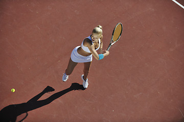 Image showing young woman play tennis outdoor