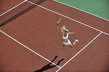 Image showing young woman play tennis outdoor