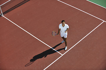 Image showing young woman play tennis outdoor