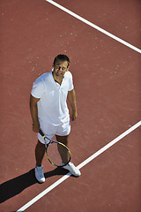 Image showing young man play tennis