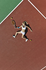 Image showing young woman play tennis outdoor