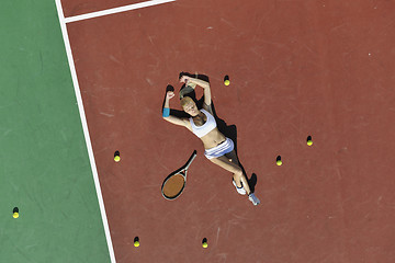 Image showing young woman play tennis outdoor