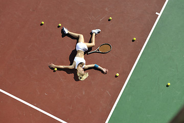 Image showing young woman play tennis outdoor