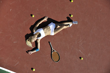 Image showing young woman play tennis outdoor