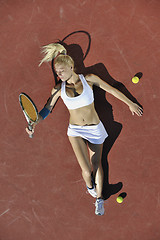 Image showing young woman play tennis