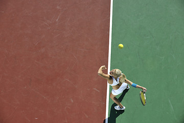 Image showing young woman play tennis outdoor