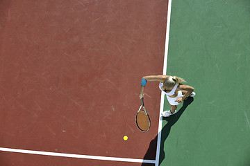 Image showing young woman play tennis outdoor