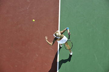 Image showing young woman play tennis outdoor