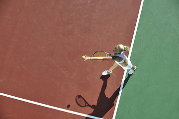 Image showing young woman play tennis outdoor