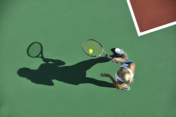 Image showing young woman play tennis outdoor